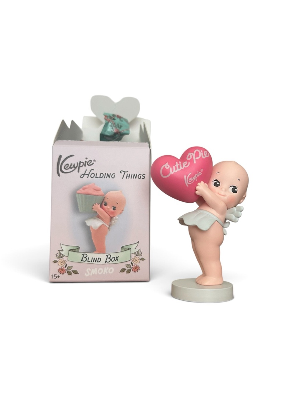 Smoko Kewpie holding a heart figurine - blind box